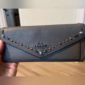 Coach wallet with metallic studded details